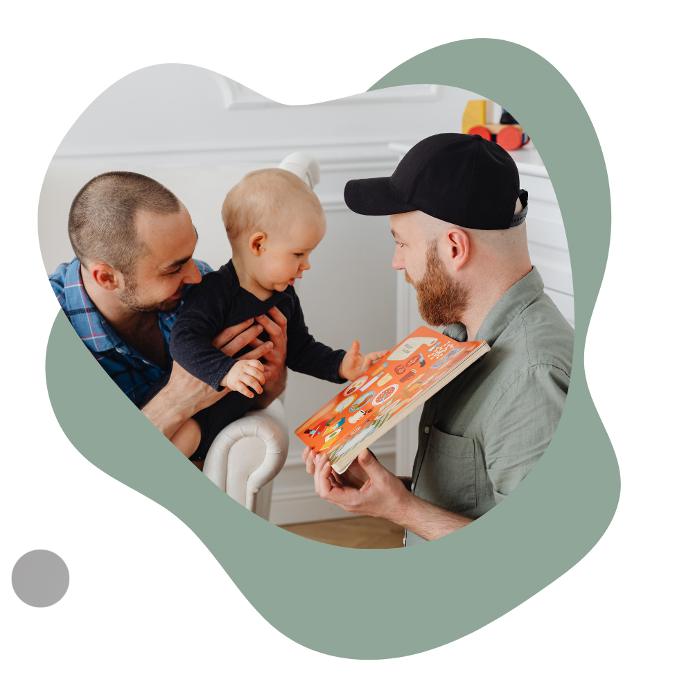 Couple reading to baby