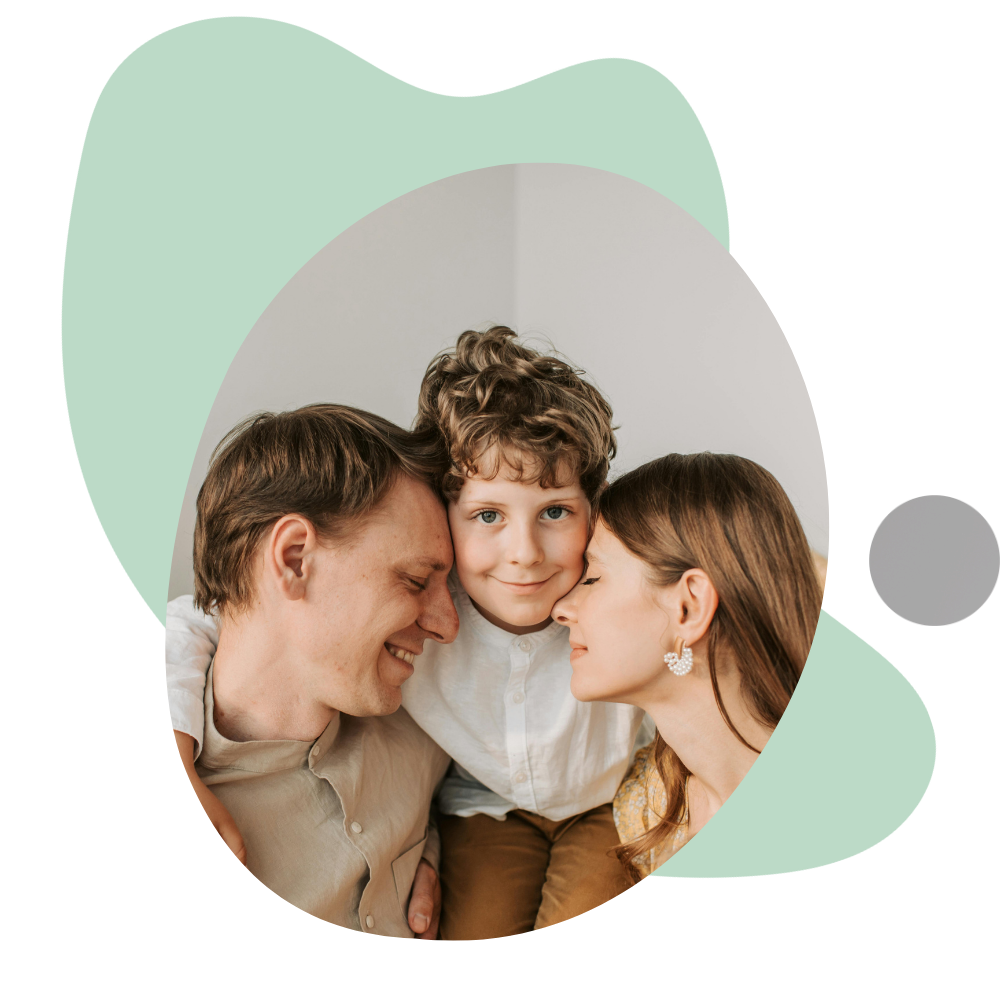 Parents standing affectionately with kid